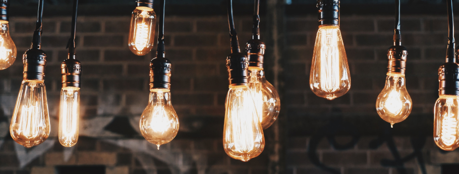 Stunning light bulbs in front of a brick wall