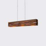 Aeris 54 Linear Pendant by Cerno in walnut and brushed aluminum, lit