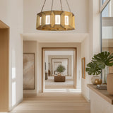 Aged Brass Austen Chandelier by Modern Forms in Living Area