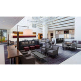 Altus Floor Lamp by Cerno in a hotel lobby lounge