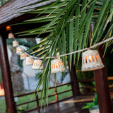 Aurora Solar String Lights - strung under a pergola