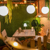 Aurora Solar String Lights - over a courtyard table
