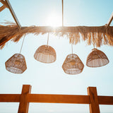 Bossa Portable Pendant Light - hung from a beach pergola