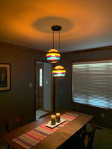 Banded Orb Pendant Cranberry By Siemon Salazar Lifestyle View