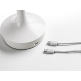 Bon Jour Unplugged Table Lamp Detail Charging By Flos - Lifestyle View