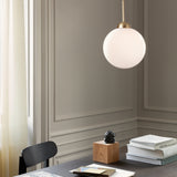 Brushed Brass/Opal Large Apiales Single Pendant Light by Nuura in Study Room