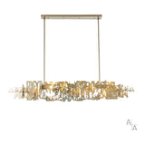 Brutus Linear Suspension Large, shown in Modern Brass, by Hubbardton Forge