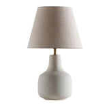 Búzios Table Lamp by Geo Contemporary in White ceramic with a Rustic Linen fabric shade and brass-tone details