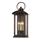 Chaplin Wall Sconce by Troy Lighting in Vintage Bronze, 4-Light clear-glass harbor lantern