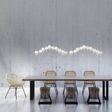 Chrysalis 10-Light Crystal Linear Suspension lifestyle view by Hubbardton Forge