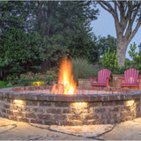 Contour Hardscape Step Light by Dals in a retaining wall