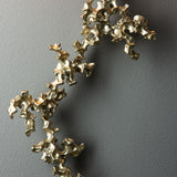 Coral Wall Sconce detail in Modern Brass, by Hubbardton Forge