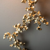 Coral Wall Sconce detail in Modern Brass, by Hubbardton Forge