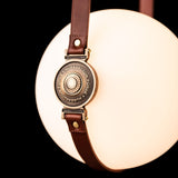 Derby Small LED Pendant detail in Black, Antique Brass, Chestnut Leather & Branded Plate, Standard, by Hubbardton Forge