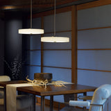 Disq LED Pendant lifestyle view by Hubbardton Forge