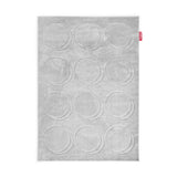 Soft grey rug with rows of raised tonal circles in a tufted dot pattern — Dot Carpet by Fatboy