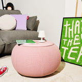 Edison La Surprise Table Lamp - on a pouf in a living room
