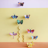 Fern Striped Butterfly Wall Art, styled in an interior