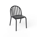 Anthracite outdoor chair with rounded spindle back and curved tubular frame on four splayed legs — Fred's Chair by Fatboy