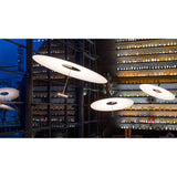 Flying Disc Pendant by Ingo Maurer - Lifestyle View 1