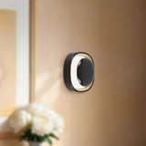 Glossy Black Pebble Wall Sconce by Kuzco Lighting
