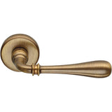 Ida Door Lever in Antique Brass by Colombo Design