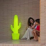 Kaktus Floor Lamp - Lime With Cable, beside a family