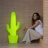 Kaktus Floor Lamp - Lime With Cable, beside a seated guest