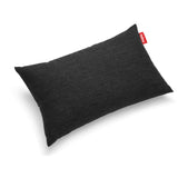Rectangular cushion in heathered charcoal outdoor fabric with a red brand tab — King Pillow by Fatboy