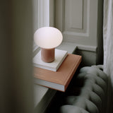 Karl-Johan Portable Table Lamp Earth Red By New Works - Lifestyle View4