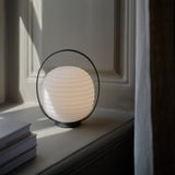 Lantern Portable Table Lamp By New Works - Lifestyle View2
