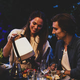 Lite-Up Play Mini JBL Battery Table Lamp - Earth, at an outdoor dinner