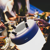 Lite-Up Play JBL Battery Table Lamp - Ocean Blue, at a dinner table