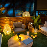 Lola Slim Portable Table Lamp - on a terrace at night
