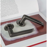 Lund Door Lever in Matte Graphite lifestyle view by Colombo Design