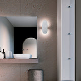Matte White Vela Wall Sconce by Penta in Bathroom