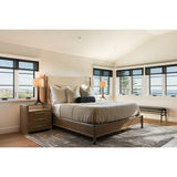 Nauta Table Lamp by Cerno on a nightstand in a bright bedroom