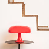 Nessino Table Lamp Orange By Artemide Lifestyle View