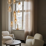 Nordic Gold/Gold Anoli 3 Multi-Light Suspension by Nuura in Living Area
