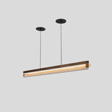 Nubis Linear Pendant by Cerno in walnut with black split canopy, angled view