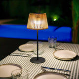 Okinawa Solar Table Lamp - on a set table by a pool