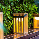 Okinawa Solar Lantern - lit among plants