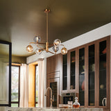 Oberon Adjustable Chandelier Heritage Brass By Frederic Ramond Lifestyle View1