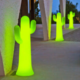 Pancho Floor Lamp - Lime With Cable, lining a walkway