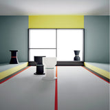 Pa.He.Ko Side Table - black and white in a gallery room