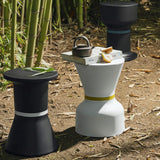 Pa.He.Ko Side Table - black and white in a bamboo garden