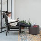 Point Pouf Ottoman - Dark Grey, as a footrest