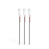 Set of three white solar garden lamps with conical tops on slender black ground spikes with red cords — Pret-a-Racket Solar Floor Lamp by Fatboy