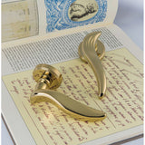 Piuma Door Lever in Polished Brass lifestyle view by Colombo Design