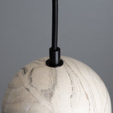 Powder Coated Matte Black Rosa Marbled Ceramic Globe Pendant by Mullan Lighting Zoomed View